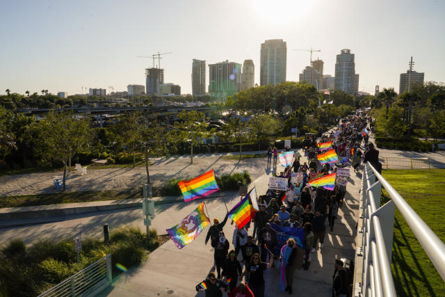 FILE - Marchers make their way toward the St. Pete Pier in St. Petersburg, Fla., on March 12, 2022, during a march to protest the controversial "Don't say gay" bill passed by Florida's Republican-led legislature. For many of those who live in Florida, recent months in 2023 have brought some changes — many linked to Gov. Ron DeSantis. (Martha Asencio-Rhine/Tampa Bay Times via AP, File)
