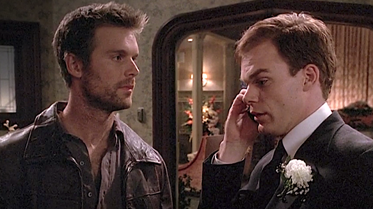  Nate and David talk at a funeral on Six Feet Under. 