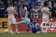 San Jose Earthquakes midfielder Jamiro Monteiro (35) scores a goal past Portland Timbers goalkeeper Aljaž Ivačič (31) during the second half of an MLS soccer match in San Jose, Calif., Wednesday, May 18, 2022. San Jose won 3-2. (AP Photo/Tony Avelar)