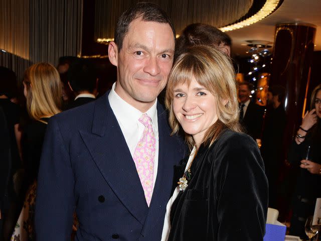 <p>David M. Benett/Getty</p> Dominic West and Catherine Fitzgerald attend a charity dinner hosted by Nicola Formby and AA Gill with Dana Hoegh in support of Borne on February 3, 2015 in London, England.
