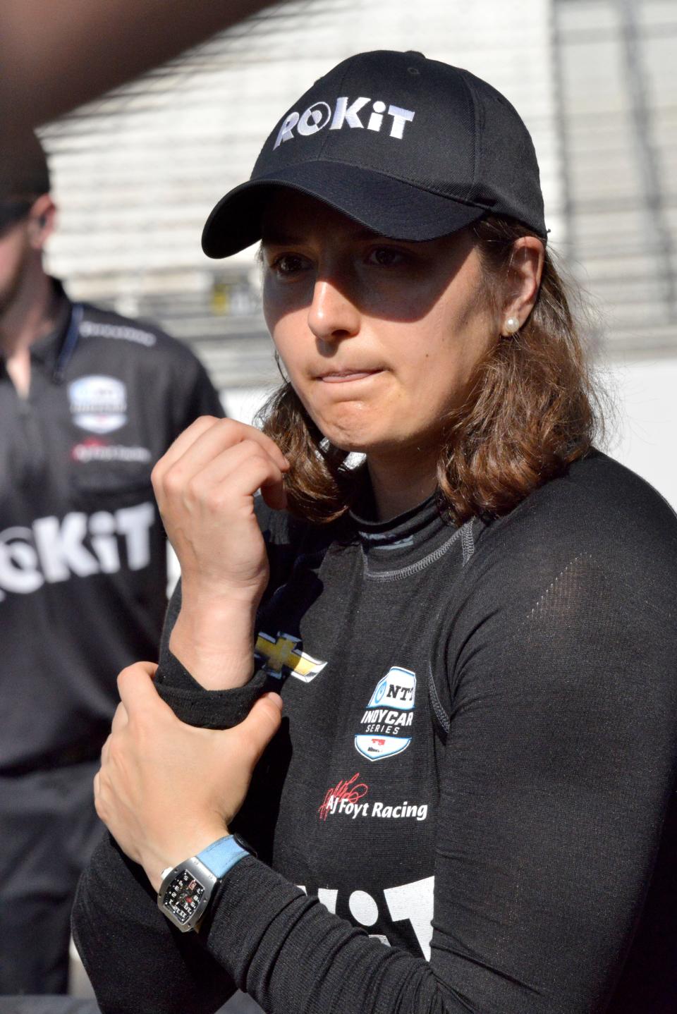 A. J. Foyt Enterprises driver Tatiana Calderon (11) stands in pit lane Friday, May 13, 2022, during practice for the GMR Grand Prix at Indianapolis Motor Speedway. 