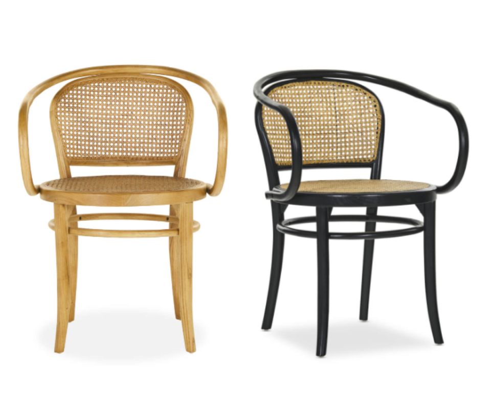 A natural Bentwood rattan chair in elm wood stands front on the left against a white background with the same style in black wood and beige rattan on the right.