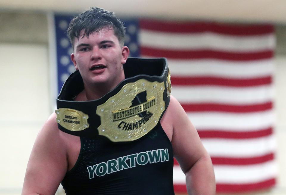 Yorktown's George Gjergi and Ossining's Marlon Wheatley wrestle in the 285-pound weight class during the Westchester County wrestling championship at Yonkers High School Jan. 20, 2024. Gjergi won the match.