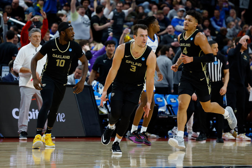 PITTSBURGH, PENNSYLVANIA - MARCH 21: Jack Gohlke #3 of the Oakland Golden Grizzlies reacts after a basket in the second half of the game against the Kentucky Wildcats during the first round of the 2024 NCAA Men's Basketball Tournament held at PPG PAINTS Arena on March 21, 2024 in Pittsburgh, Pennsylvania. (Photo by Justin K. Aller/NCAA Photos via Getty Images)