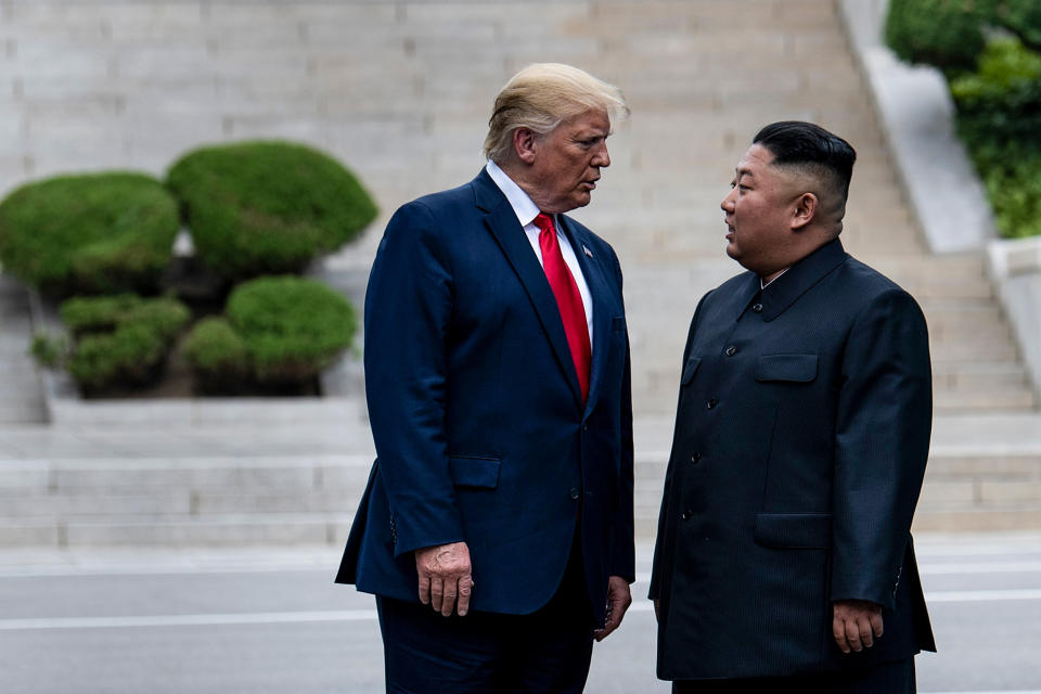 President Donald Trump and North Korea's leader Kim Jong-un stand on North Korean soil while walking to South Korea in the Demilitarized Zone on June 30, 2019, in Panmunjom, Korea. (Brendan Smialowski / AFP via Getty Images file)