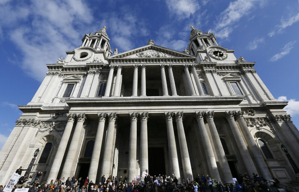 Demonstrators gather as they celebrate the anniversary of 'Occupy', outside St Paul's cathedral in London, Saturday, Oct. 13, 2012. Monday Oct. 15, marks the first anniversary of Occupy, the day when demonstrations and occupations took place in cities around the world. (AP Photo/Kirsty Wigglesworth)