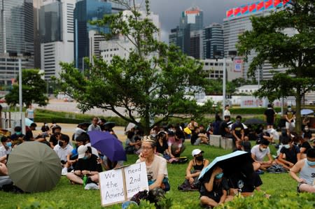 People take part in a general strike at Tamar Park in Hong Kong