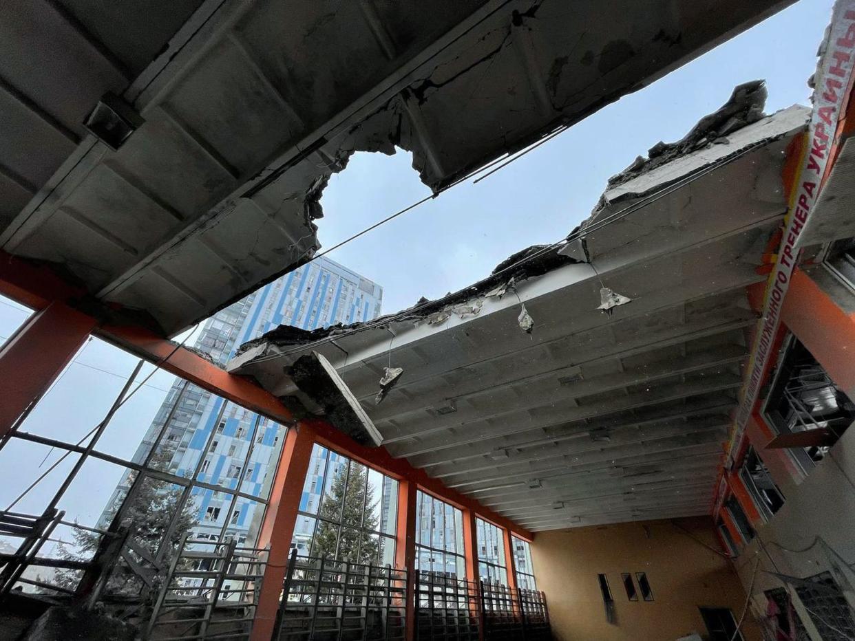 In this photo provided by Yurii Kochubei, a view of the damage after shelling on a sports venue, in Kharkiv, Ukraine, Saturday, March 5, 2022.