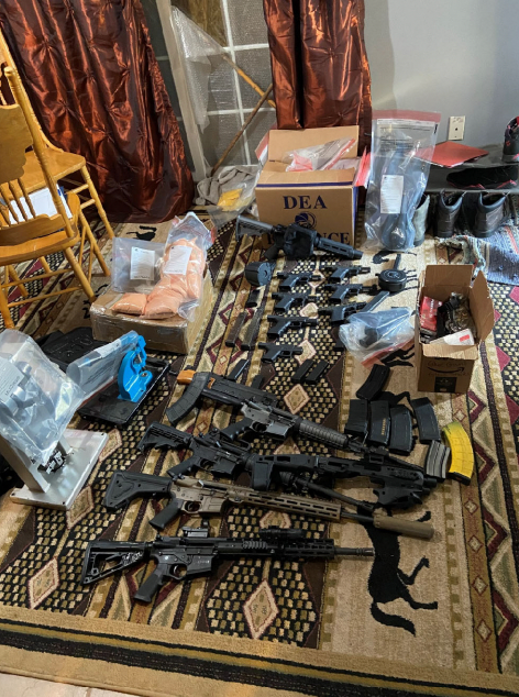 A Battle Creek man has been indicted for allegedly possessing more than four kilograms of methamphetamine and machineguns, shown here.