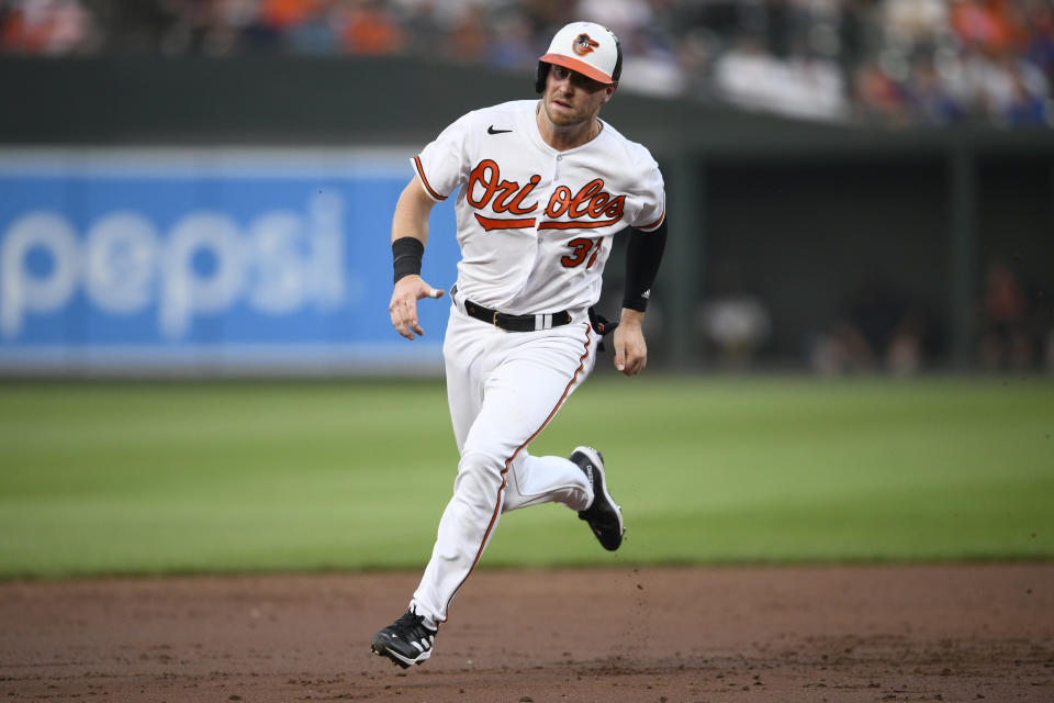 Baltimore Orioles' Ryan O'Hearn runs towards third en route to scoring on a double by Aaron Hicks during the second inning of a baseball game, Tuesday, July 18, 2023, in Baltimore. Hicks advanced to third on a fielding error by Dodgers center fielder James Outman. (AP Photo/Nick Wass)