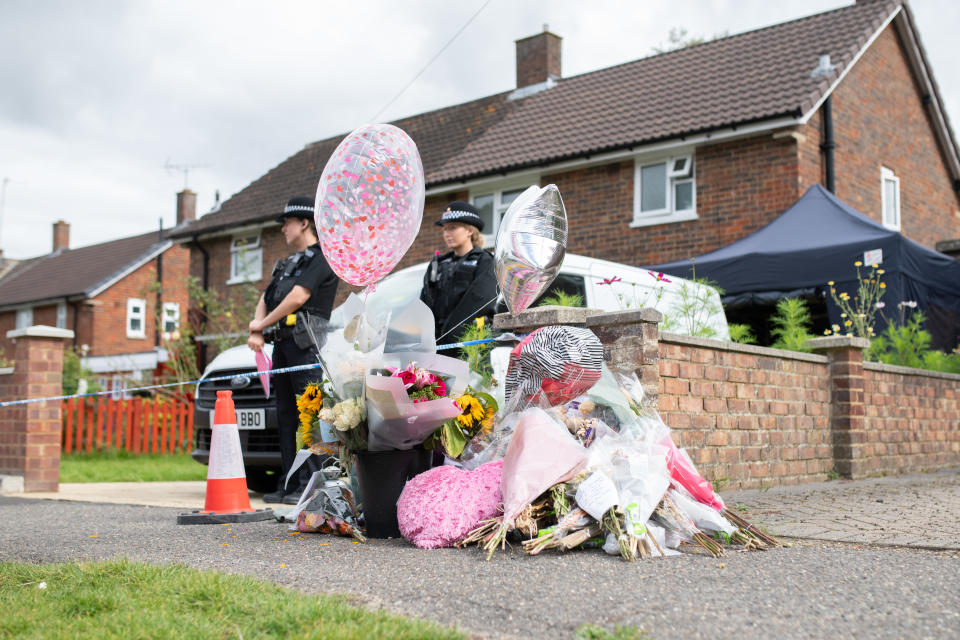 Flowers and balloons were left outside Sara Sharif’s home following her death. (SWNS)