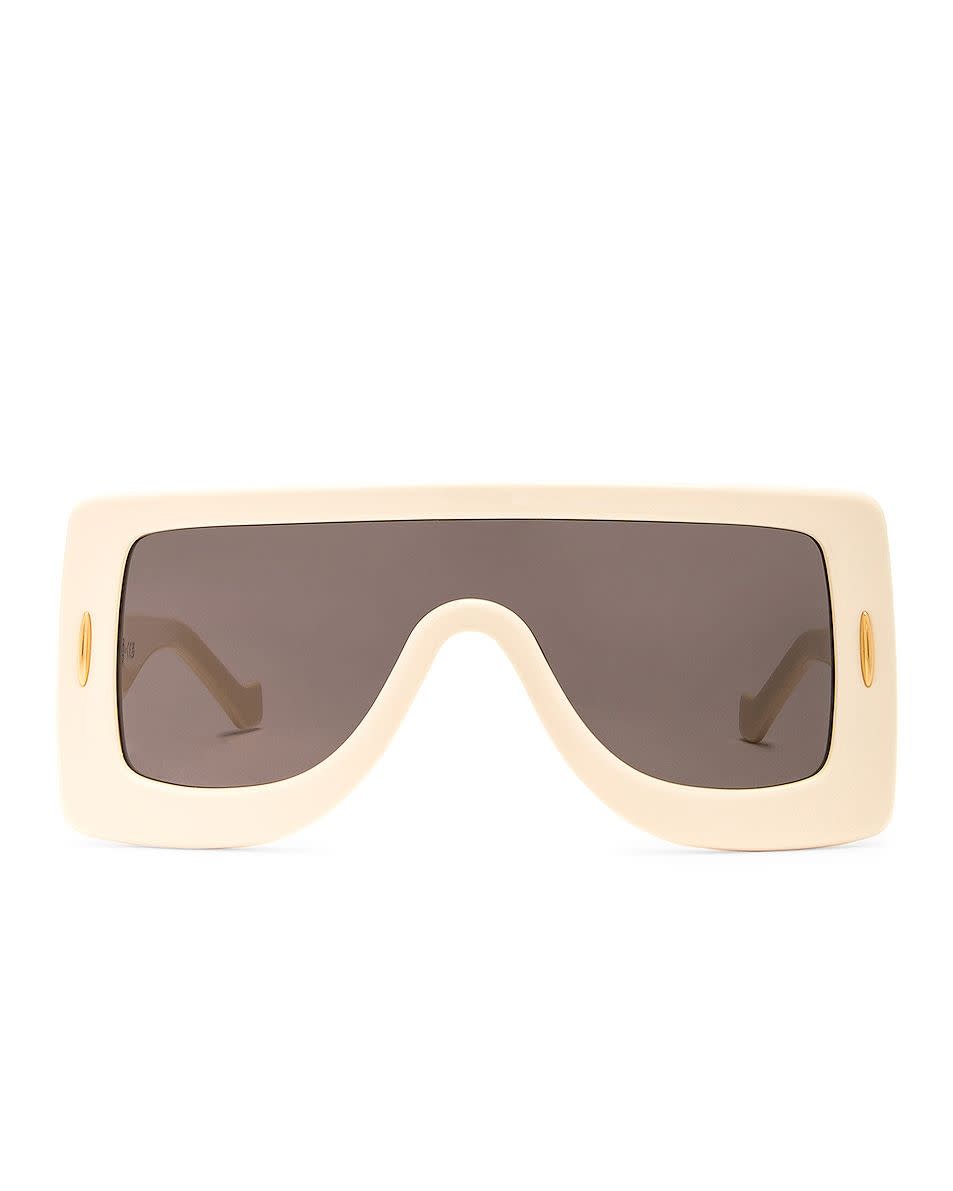 <p><a href="https://go.redirectingat.com?id=74968X1596630&url=https%3A%2F%2Fwww.fwrd.com%2Fproduct-loewe-square-sunglasses-in-shiny-ivory%2FLOEW-WA206%2F&sref=https%3A%2F%2F" rel="nofollow noopener" target="_blank" data-ylk="slk:Shop Now;elm:context_link;itc:0;sec:content-canvas" class="link rapid-noclick-resp">Shop Now</a></p><p>Shield Square Sunglasses</p><p>$390.00</p><p>fwrd.com</p><span class="copyright">Courtesy of FRWD</span>