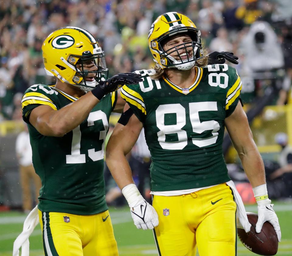 Green Bay Packers wide receiver Allen Lazard (13) celebrates with tight end Robert Tonyan (85) after Tonyan scored a touchdown against the Detroit Lions during their football game Monday, September 20, 2021, at Lambeau Field in Green Bay, Wis. Dan Powers/USA TODAY NETWORK-Wisconsin