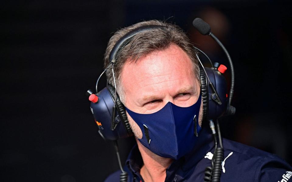 Red Bull Racing's team principal Christian Horner looks on during the third practice session ahead of the Qatari Formula One Grand Prix at the Losail International Circuit, on the outskirts of the capital city of Doha, on November 20, 2021 - AFP