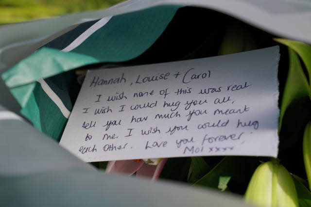 A message on a floral tribute near to the scene in Ashlyn Close, Bushey 