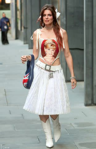 <p>Rachpoot/Bauer-Griffin/GC</p> Julia Fox wears princess Diana Corset while out in London in October 2023