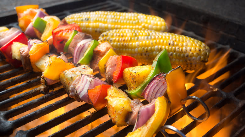 grilled vegetable skewers and corn