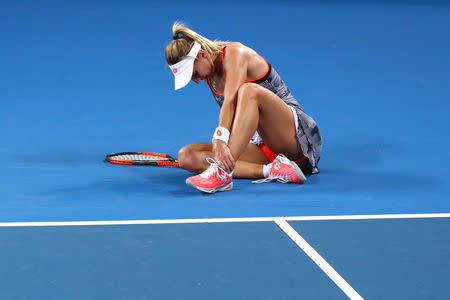 Tennis - Brisbane International - Women's Final - Pat Rafter Arena, Brisbane, Australia, January 6, 2019 Ukraine's Lesia Tsurenko with an injury during her match against Czech Republic's Karolina Pliskova REUTERS/Patrick Hamilton