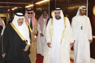 FILE - In this image made available by Emirates News Agency, WAM, UAE President Sheikh Khalifa bin Zayed Al Nahyan, 2nd right, walks with Saudi Arabia's Prince Nayef bin Abdul Aziz during the 31st Gulf Cooperation Council, GCC summit in Abu Dhabi, Monday, Dec. 6, 2010. Sheikh Khalifa died Friday, May 13, 2022, the government's state-run news agency announced in a brief statement. He was 73. (AP Photo/WAM-HO, File)
