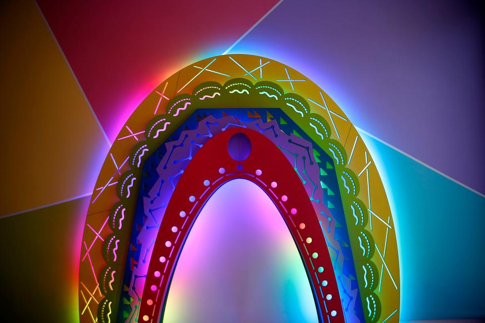 A rainbow archway offers an ideal spot for selfies inside Factory Obscura's art experience "Synesthesia"  at the Fred Jones Jr. Museum of Art in Norman, Okla., Thursday, June, 23, 2022. Open to the publish through June 4, 2023, the interactive exhibition is inspired by works from the permanent collection at the University of Oklahoma's art museum.