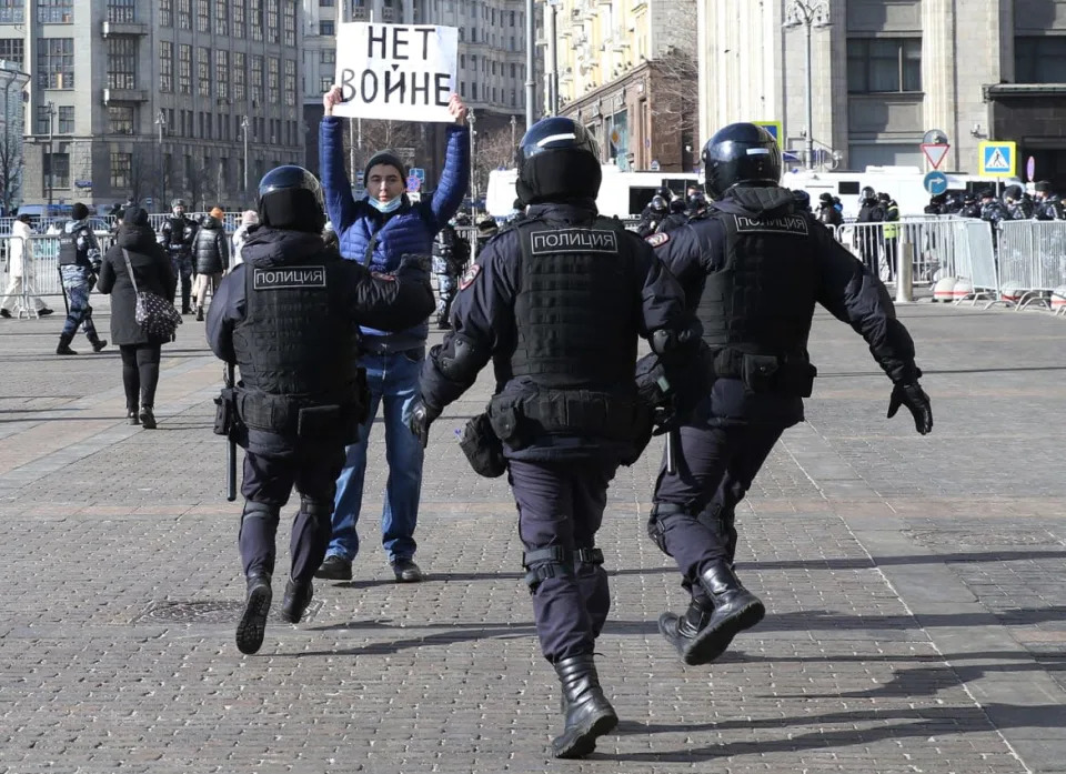 <div class="inline-image__caption"><p>Russian Police officers run to detain a man holding a poster reads "No war" during a unsanctioned protest rally at Manezhnaya Square in front of the Kremlin, March 13,2022, in Moscow, Russia. Hundreds people were detained during an anti-war rally.</p></div> <div class="inline-image__credit">Contributor/Getty Images</div>