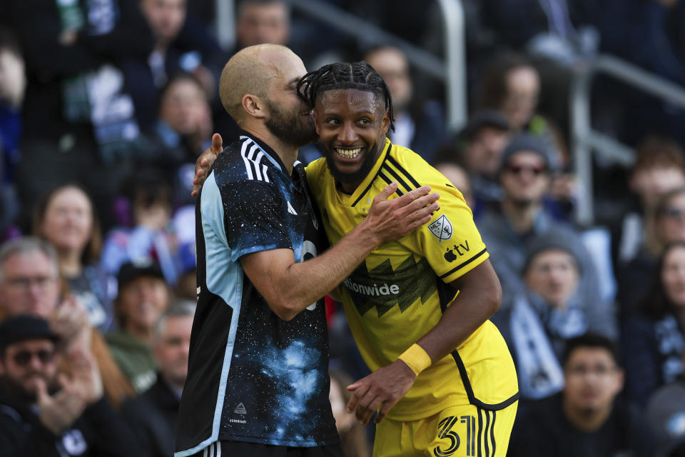 Columbus Crew defender Steven Moreira (31) and Minnesota United forward Teemu Pukki (22) react after a play during the first half of an MLS soccer match, Saturday, March 2, 2024, in St. Paul, Minn. (AP Photo/Stacy Bengs)