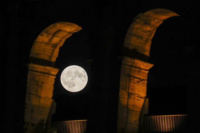 <p>Riccardo De Luca/Anadolu/getty</p> Rare super blue moon in Rome