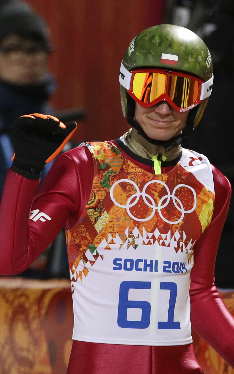 Poland's Kamil Stoch smiles after an attempt during the men's normal hill ski jumping qualification at the 2014 Winter Olympics, Saturday, Feb. 8, 2014, in Krasnaya Polyana, Russia. (AP Photo/Gregorio Borgia)
