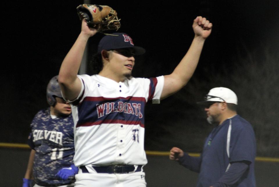 After 91 pitches, senior right-hander Alan Carreon raises his arms in celebration of his season-opening no-hitter on Friday night. Carreon struck out 15 Silver High batters and walked 2 in a 4-0 victory.