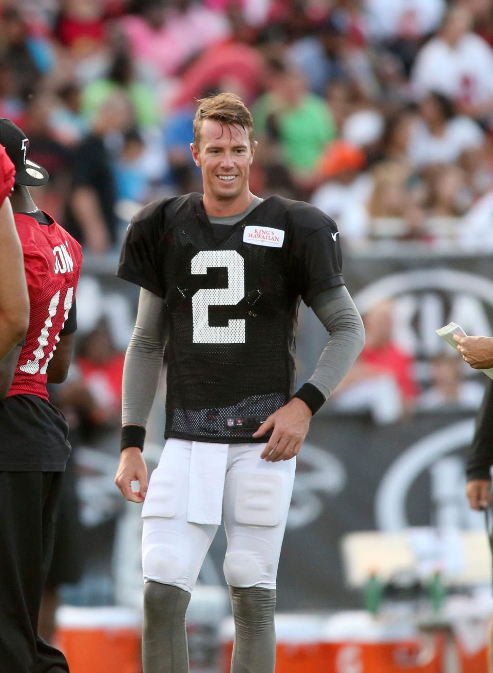 Atlanta Falcons quarterback Matt Ryan (2) is shown during the Falcons annual event, Friday Night Lights, at Archer High School Friday, Aug. 1, 2014, in Lawrenceville, Ga. The Falcons continued their tradition of staging a practice at an area high school each year. (AP Photo/Jason Getz)