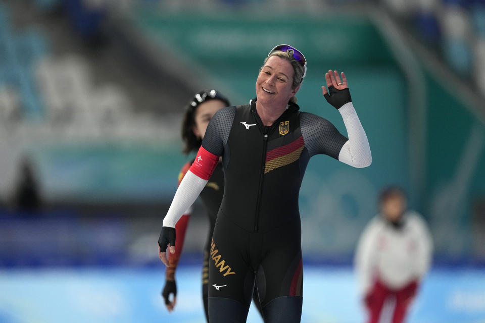 Claudia Pechstein of Germany reacts after losing her heat in the women's speedskating 3,000-meter race at the 2022 Winter Olympics, Saturday, Feb. 5, 2022, in Beijing. (AP Photo/Ashley Landis)