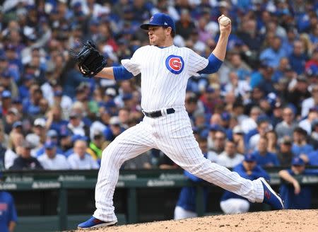 Oct 1, 2018; Chicago, IL, USA; Chicago Cubs relief pitcher Justin Wilson (37) delivers a pitch during the eighth inning against the Milwaukee Brewers in the National League Central division tiebreaker game at Wrigley Field. Mandatory Credit: Patrick Gorski-USA TODAY Sports