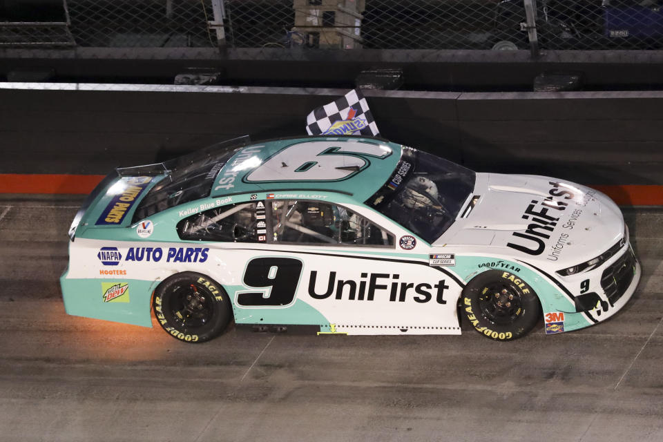 Chase Elliott celebrates does a victory lap after winning a NASCAR All-Star auto race at Bristol Motor Speedway in Bristol, Tenn, Wednesday, July 15, 2020. (AP Photo/Mark Humphrey)