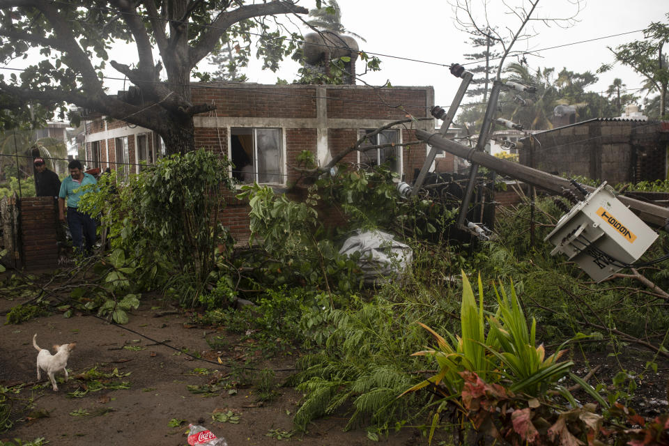 A man inspects the damage on his property in the aftermath of Hurricane Grace, in Tecolutla, Veracruz State, Mexico, Saturday, Aug. 21, 2021. Grace hit Mexico’s Gulf shore as a major Category 3 storm before weakening on Saturday, drenching coastal and inland areas in its second landfall in the country in two days. (AP Photo/Felix Marquez)