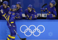 Ice Hockey - Pyeongchang 2018 Winter Olympics - Women’s Classification Match - Sweden v Korea - Kwandong Hockey Centre, Gangneung, South Korea - February 20, 2018 - Sabina Kuller of Sweden celebrates at the bench after scoring. REUTERS/David W Cerny