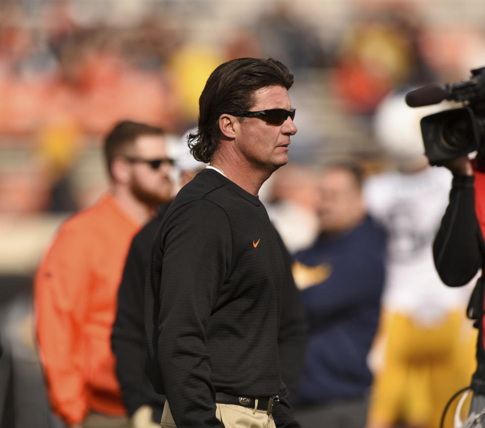 Oklahoma State head coach Mike Gundy walks the sidelines prior to an NCAA college football game in Stillwater, Okla., Saturday, Nov. 17, 2018. (AP Photo/Brody Schmidt)