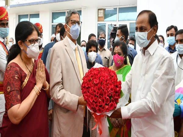 CJI Ramana being recieved by Telangana Governor Tamilisai Soundararajan and Chief Minister K Chandrashekhar Rao at Bhavan on Friday. 