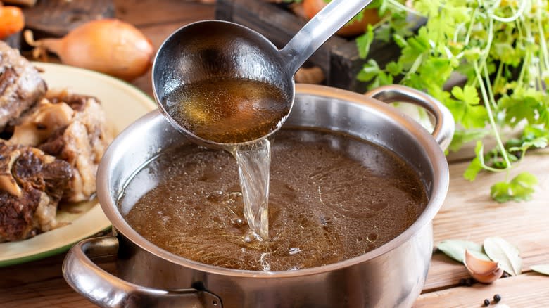 Chicken stock in a pot