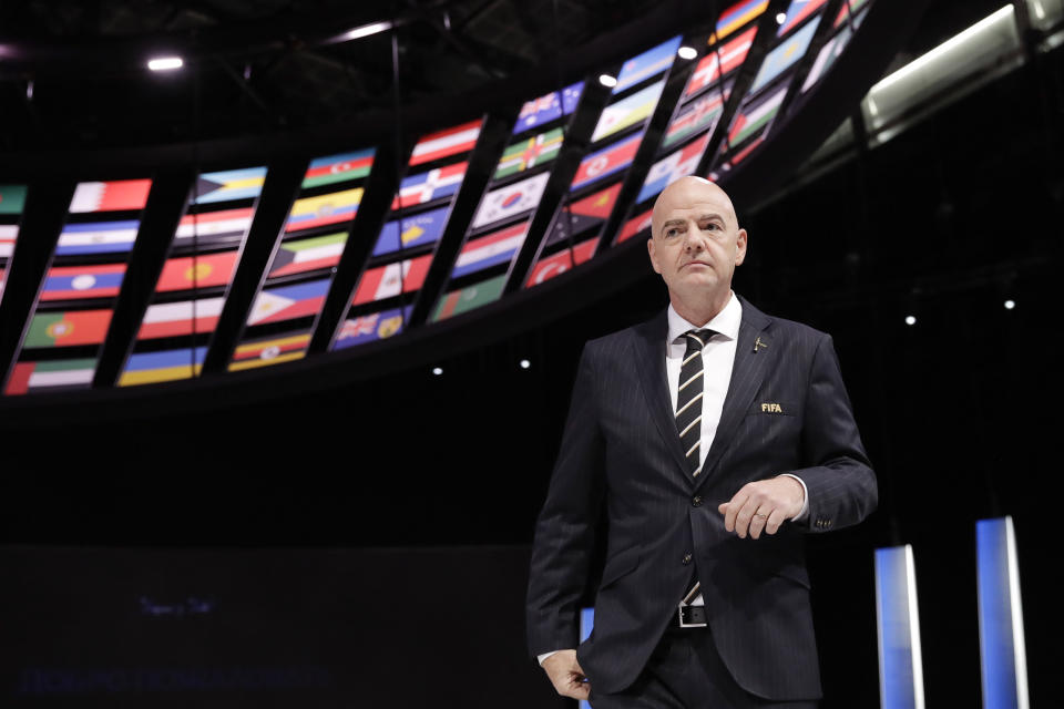 FIFA President Gianni Infantino walks on the stage before the start of the 69th FIFA congress in Paris, Wednesday, June 5, 2019. (AP Photo/Alessandra Tarantino)