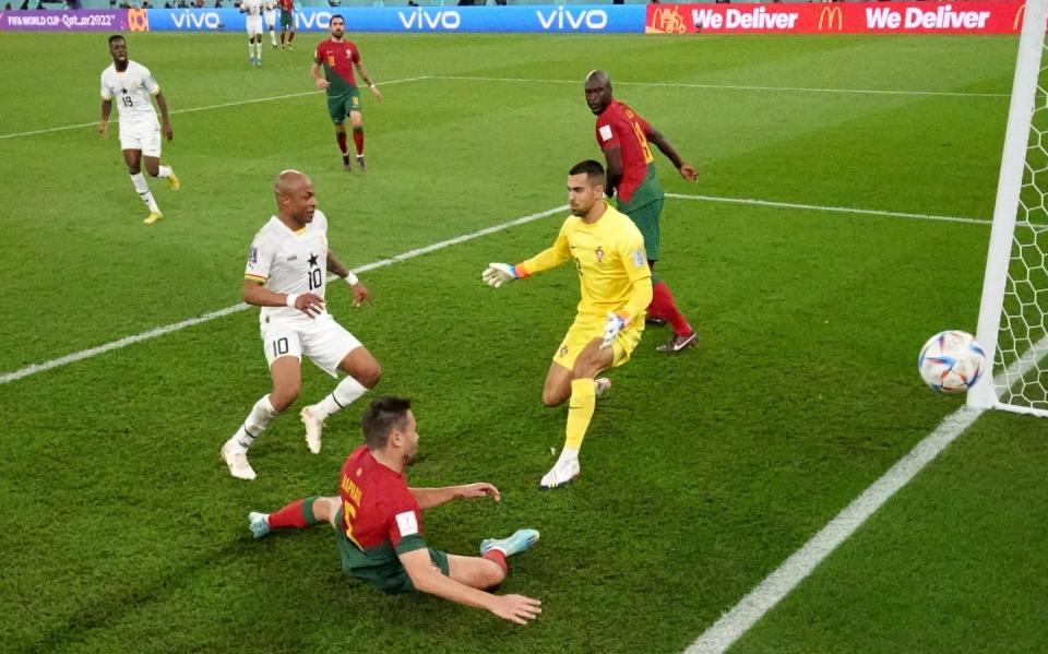 Soccer Football - FIFA World Cup Qatar 2022 - Group H - Portugal v Ghana - Stadium 974, Doha, Qatar - November 24, 2022 Ghana's Andre Ayew scores their first goal REUTERS/Hannah Mckay