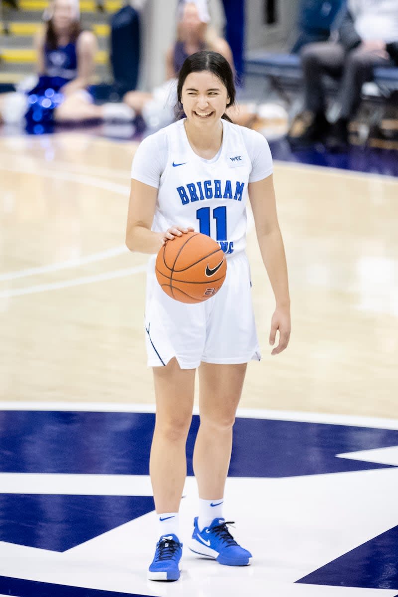 Kaylee Smiler dribbles the ball with a smile as time runs out and the BYU women's basketball team wins their fifth game in a row against Santa Clara, 71-48. | Alyssa Lyman, BYU