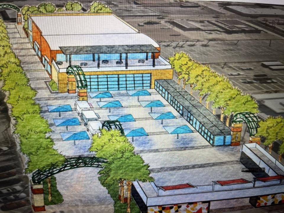 A rendering shows what the backside of the Corbin building could look like if it's transformed into a public market with vendors, restaurants, food trucks, a microbrewery, outdoor seating and new landscaping.