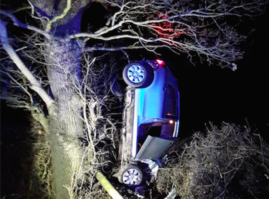 The car was found in a tree after the crash (Picture: OPU Shropshire Police)