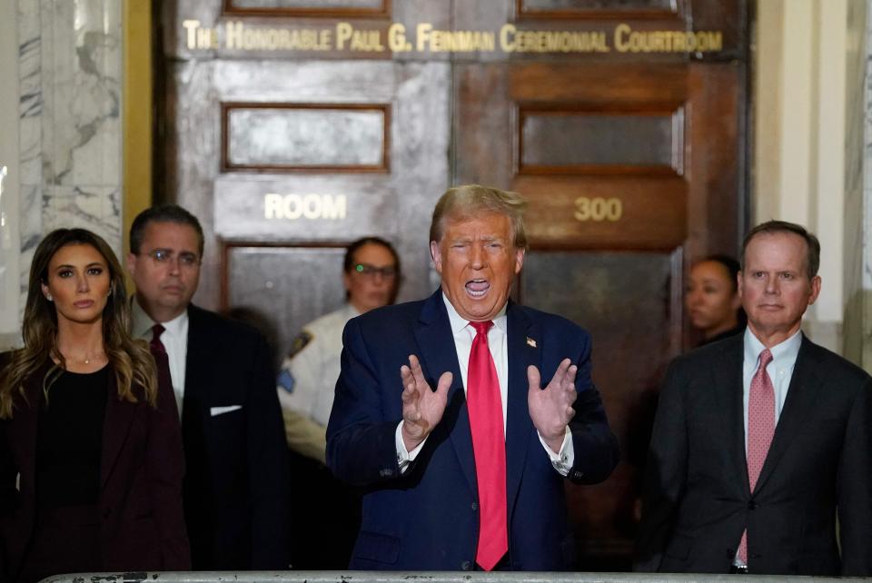 Former US President Donald Trump speaks to the press as he arrives for the third day of his civil fraud trial in New York City on Oct. 17, 2023. Trump attends the trial a day after a federal judge, in a separate criminal case, imposed a partial gag order on Trump, on Oct. 16. (Photo by TIMOTHY A. CLARY / AFP) (Photo by TIMOTHY A. CLARY/AFP via Getty Images) ORIG FILE ID: AFP_33YH98T.jpg