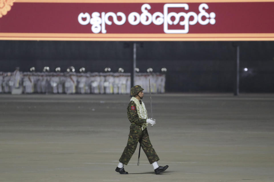 A military officer marches during a parade to commemorate Myanmar's 79th Armed Forces Day, in Naypyitaw, Myanmar, Wednesday, March 27, 2024. (AP Photo/Aung Shine Oo)