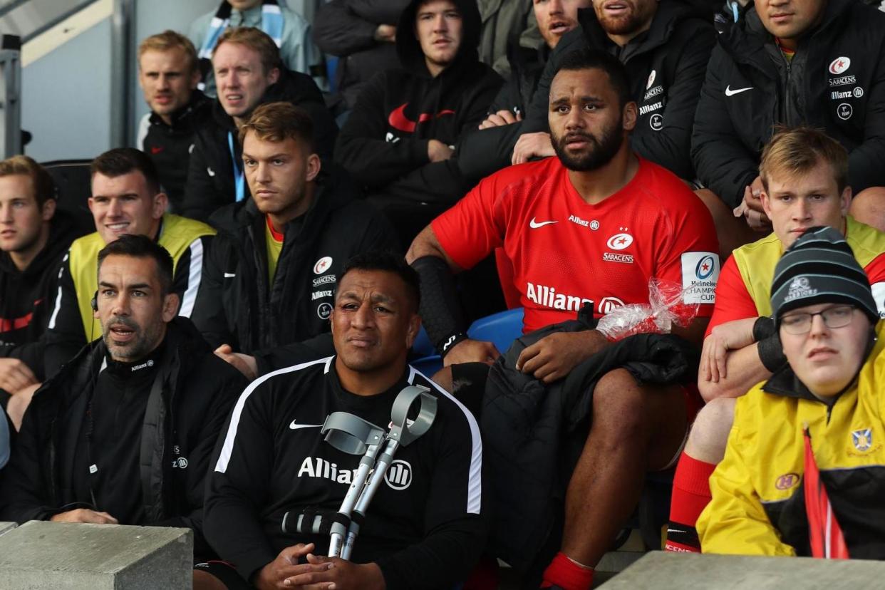 Pain game: Mako Vunipola clutches crutches, while brother Billy’s arm is covered with an ice pack after early exits: Getty Images