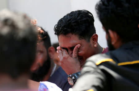 A relative of a victim of the explosion at St. Anthony's Shrine, Kochchikade church reacts at the police mortuary in Colombo, Sri Lanka April 21, 2019. REUTERS/Dinuka Liyanawatte