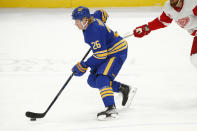 Buffalo Sabres defenseman Rasmus Dahlin (26) controls the puck during the second period of an NHL hockey game against the Buffalo Sabres, Monday, Jan. 17, 2022, in Buffalo, N.Y. (AP Photo/Jeffrey T. Barnes)