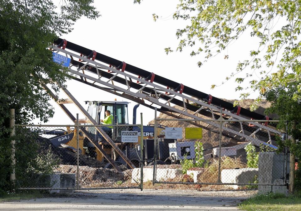 Bucklin's Tree Service operates heavy machinery on its property at 936 Appleton Road in Fox Crossing.