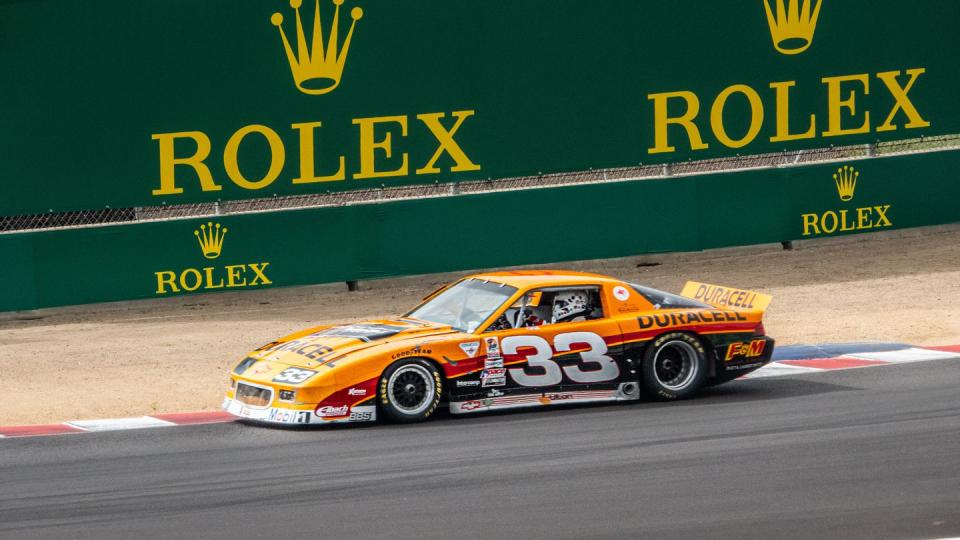 rolex monterey motorsports reunion 2023 orange camaro body